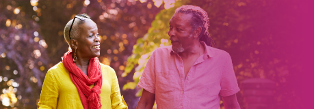 A couple on a walk together outside.